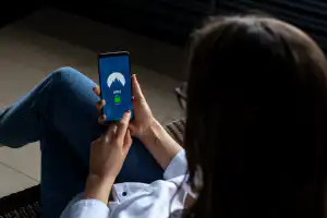 Woman looking at cellphone screen